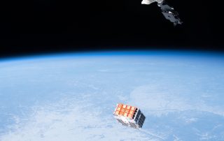 Experimental Spacecraft STPSat 4 being released into low earth orbit from SSIKLOPS (Space Station Integrated Kinetic Launcher for Orbital Payload Systems)