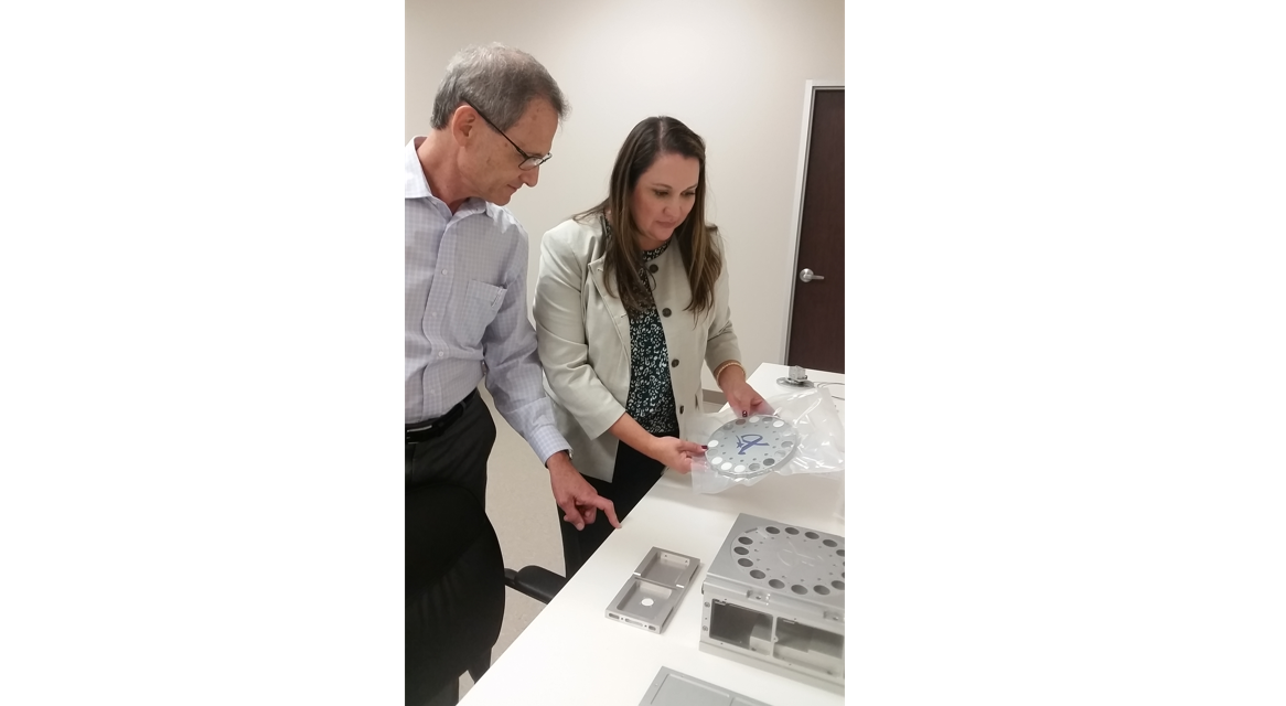 Mark Gittleman and Stephanie Murphy investigate materials for Space Science and Test and Evaluation Facility (SSTEF-1) under the NASA Tipping Point initiative